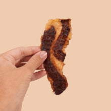 Brisket slab in hand